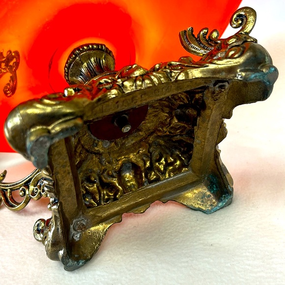 Mid Century orange glass centrepiece with cast metal Medusa faces base - Picture 6 of 15